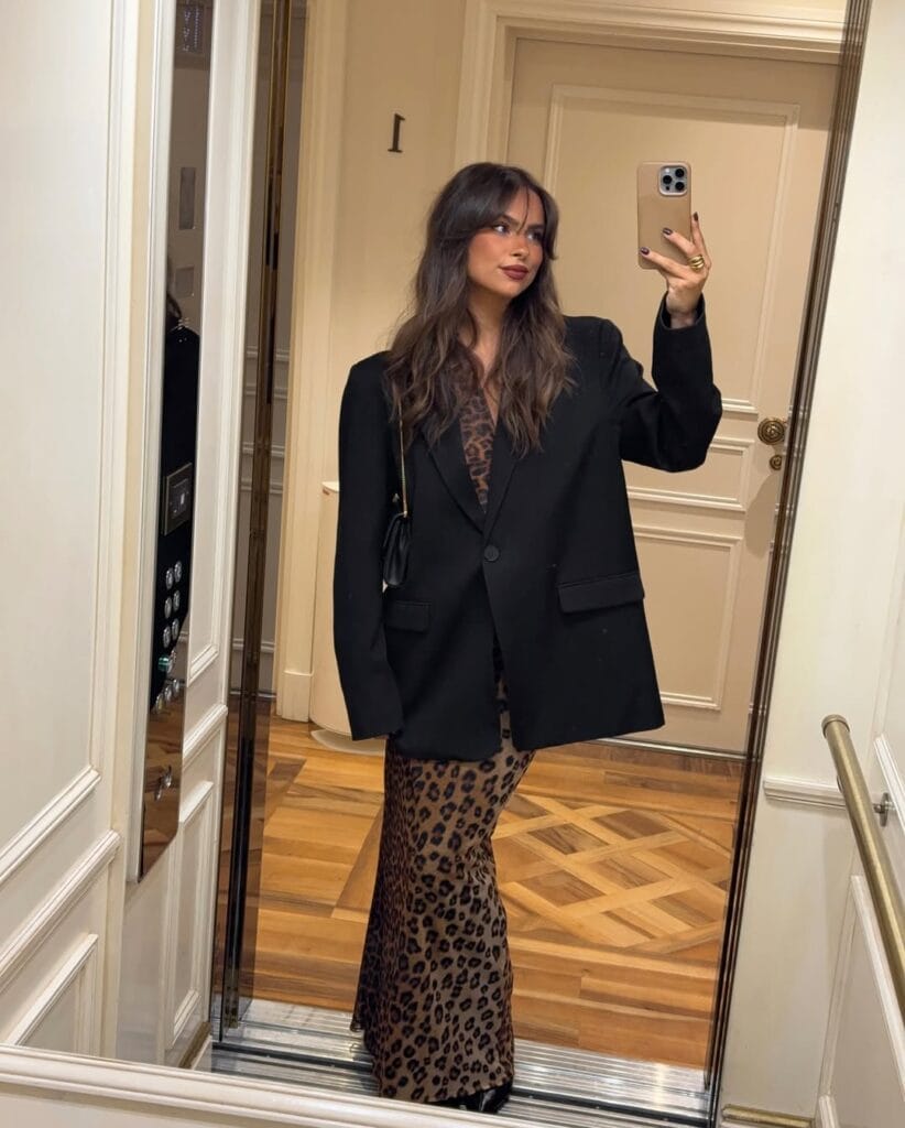 winter date outfit with black blazer, leopard print midi dress
