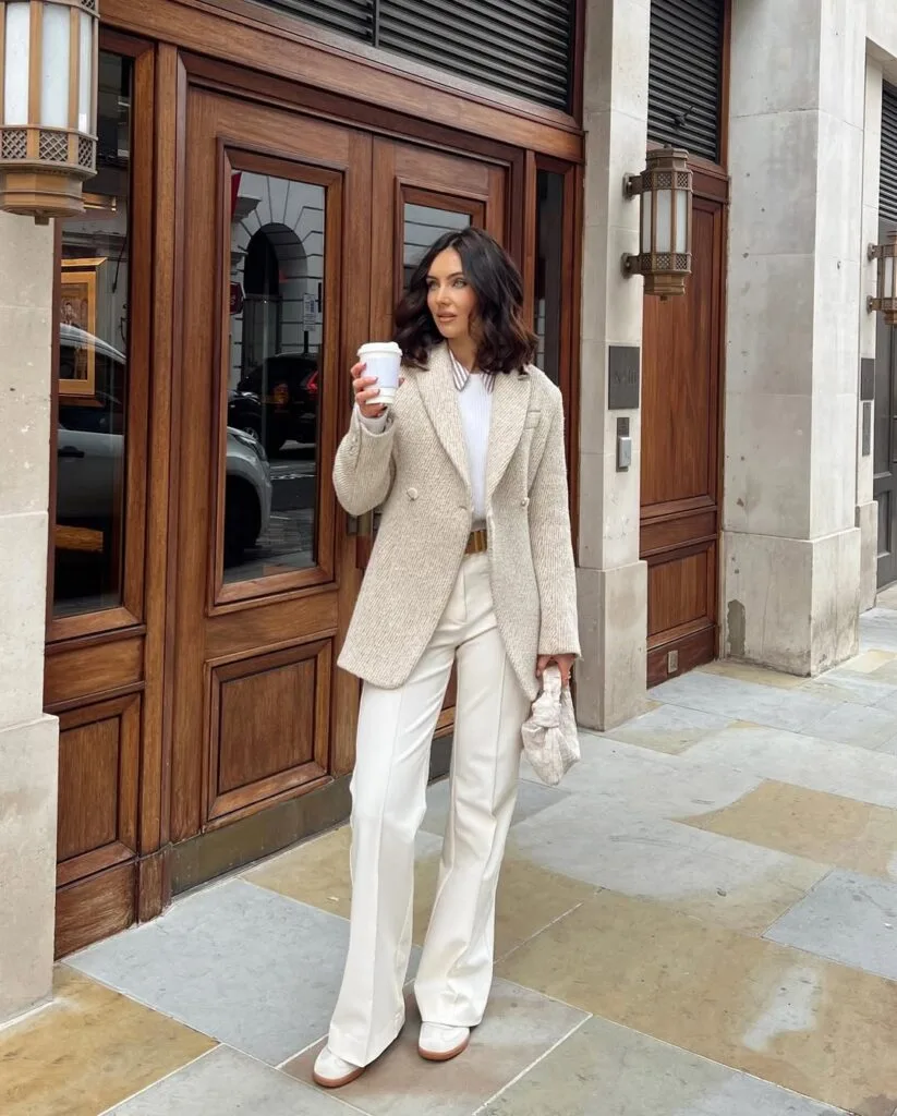 winter work outfit with tweed blazer, white sweater, white tailored trousers, neutral belt, pointed flats
