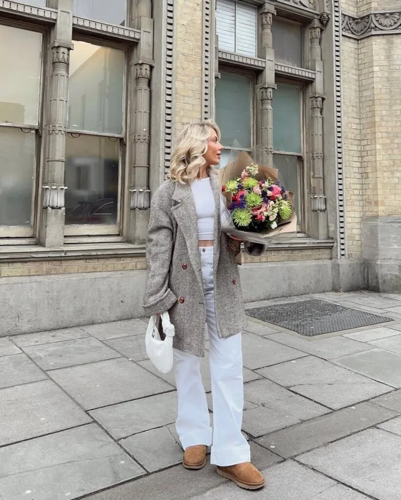 Herringbone tweed coat with white tee and white trousers, tan clogs—polished casual winter outfits.

