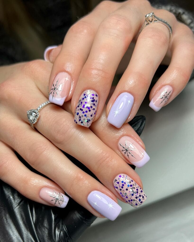 lilac nails with silver snowflakes and chunky glitter, Christmas and winter nail inspiration