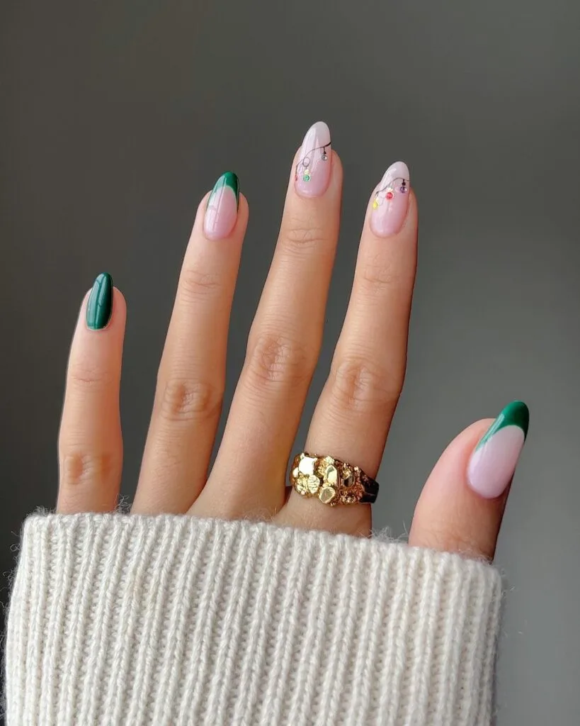 pink nails with green French tips and Christmas light nail art, festive holiday nails