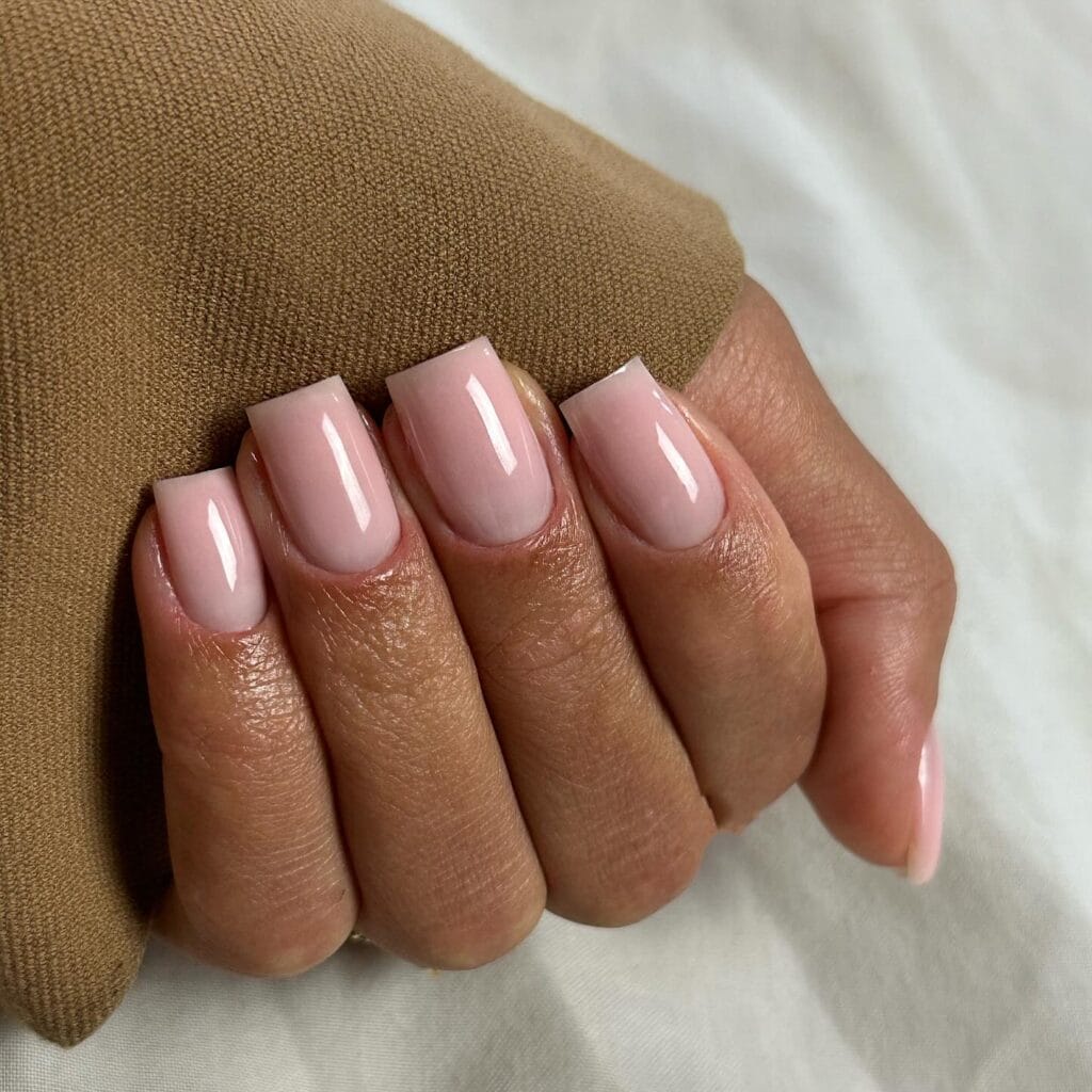 square blush nude nails with high-shine finish, winter old money nail look
