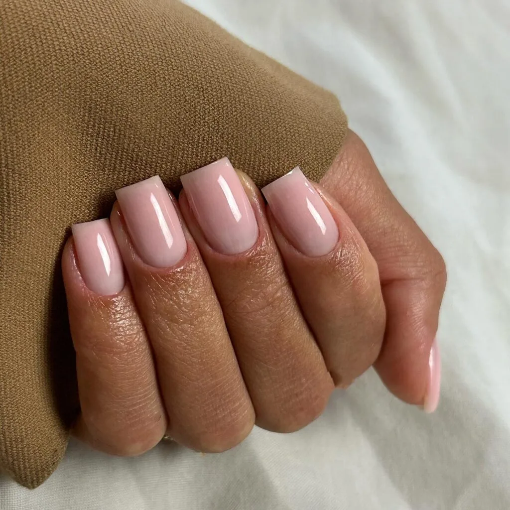 square blush nude nails with high-shine finish, winter old money nail look
