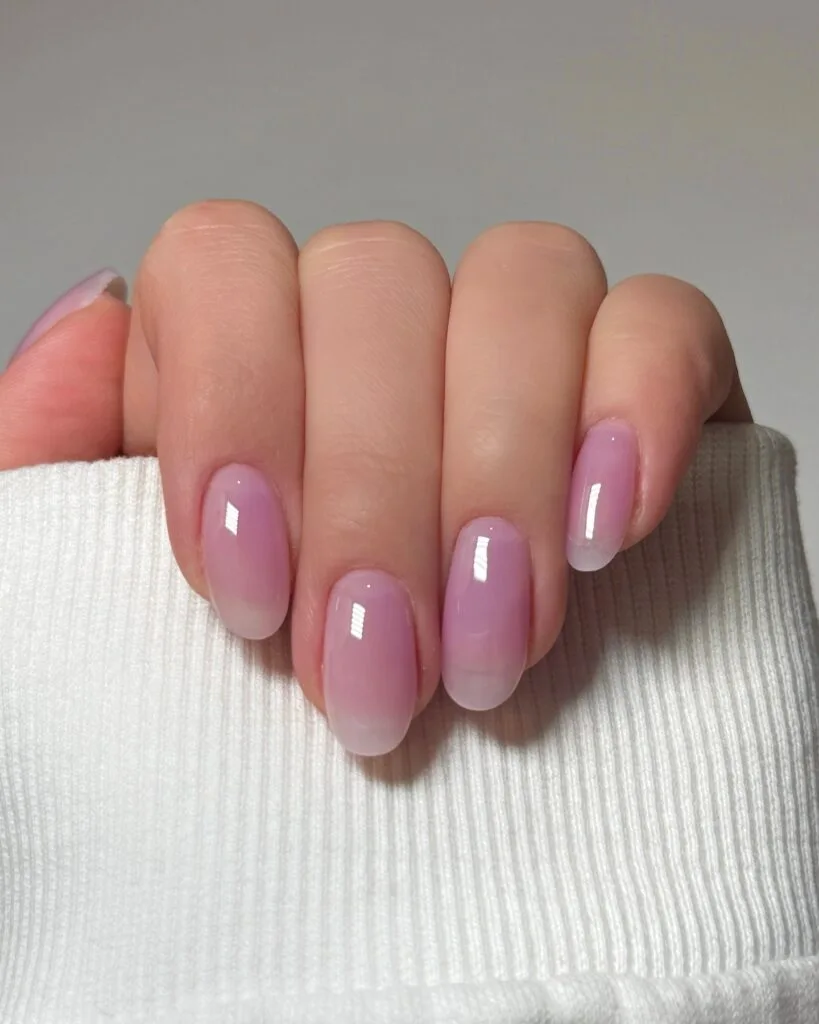 2026 nail trends, jelly pink short oval nails with high gloss finish