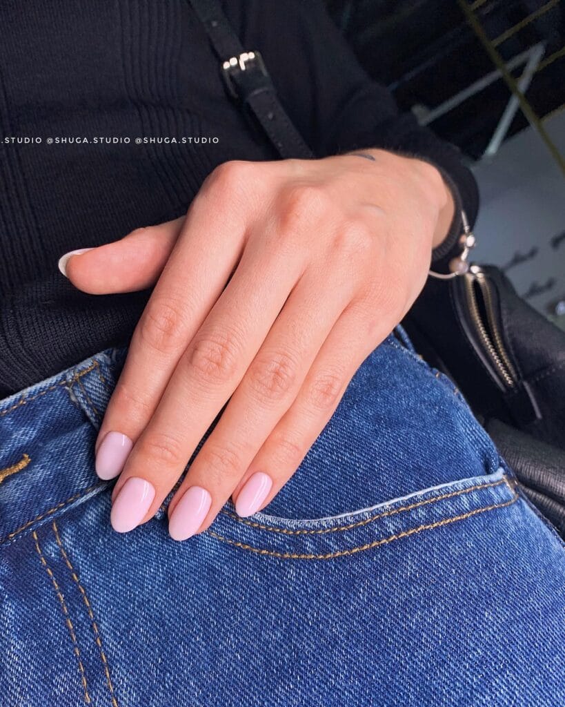 2026 nail trends, soft oval nails in dusty pink with glossy finish