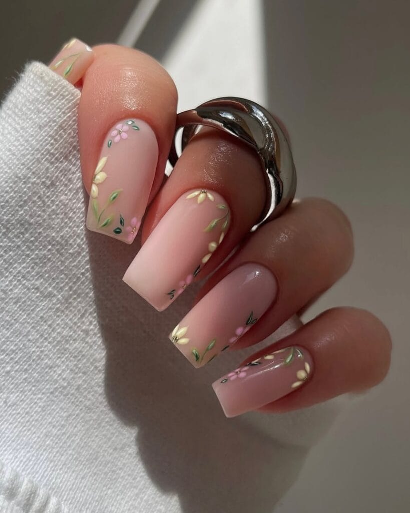 2026 nail trends, soft floral details with green leaves on nude square nails