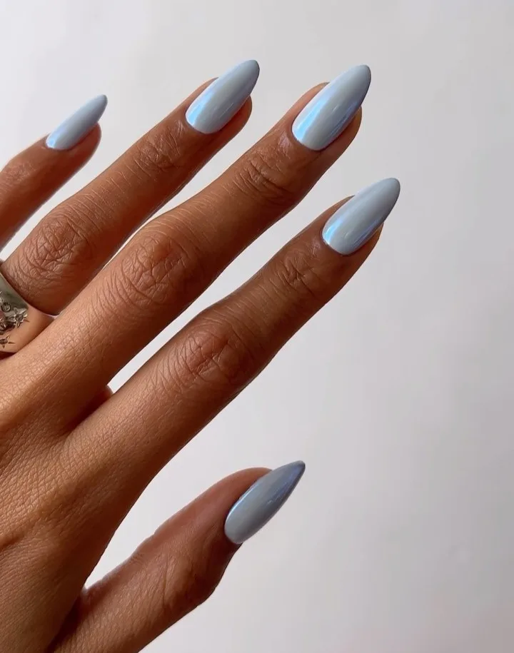 spring nail trends 2026, baby blue pastel chrome almond nails with mirror finish