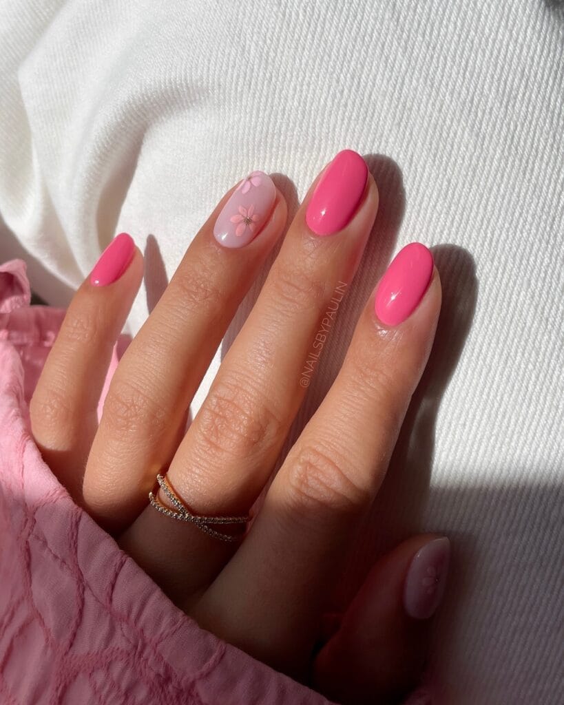 classy spring nails, short oval hot pink glossy nails with sheer nude flower accent nails