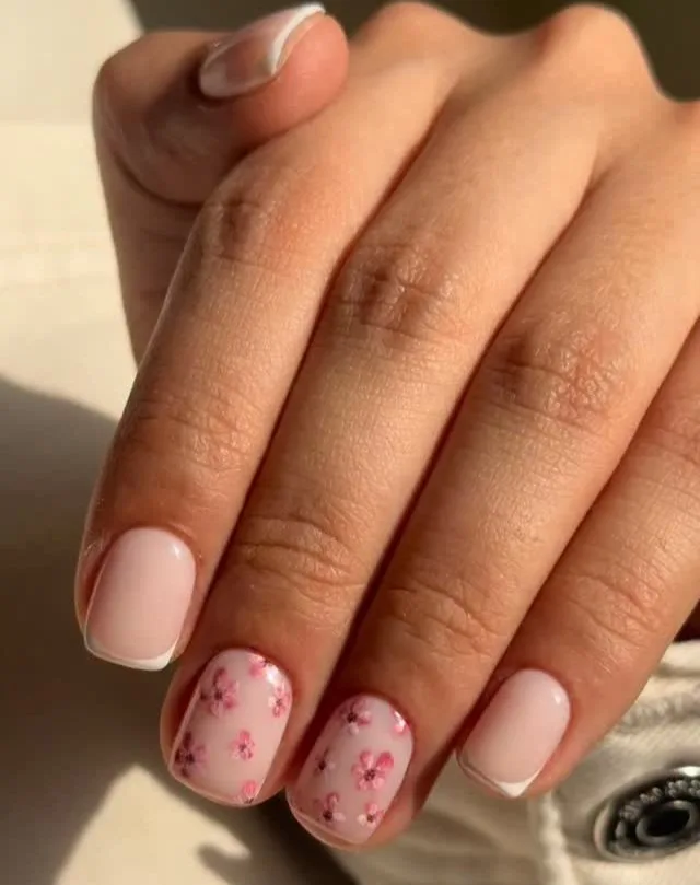 spring nail trends 2026, short round nails with pink cherry blossom accent and French tips