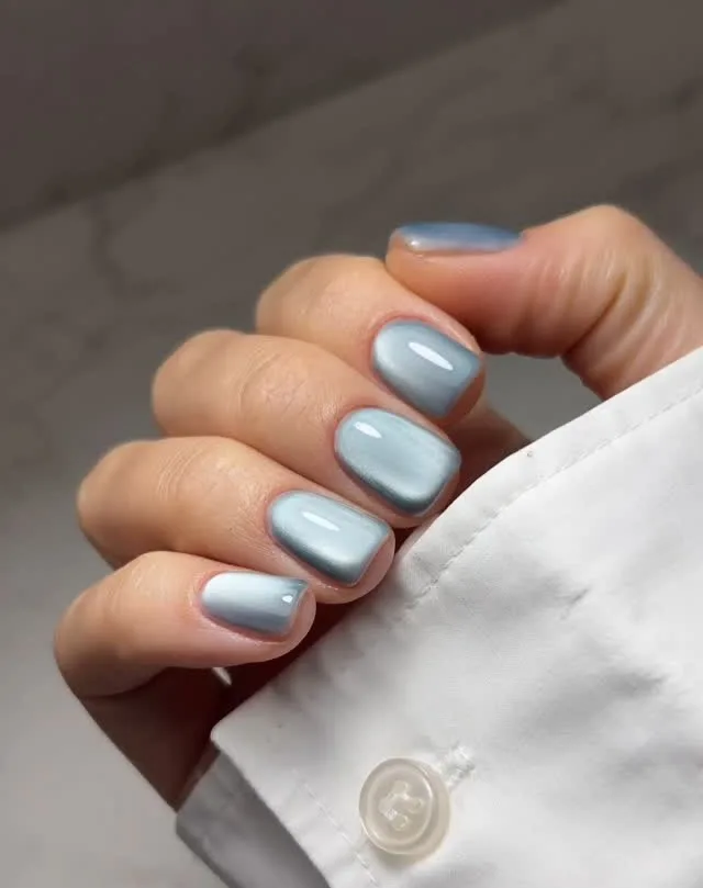 spring nail trends 2026, baby blue cat eye short square nails with glossy finish