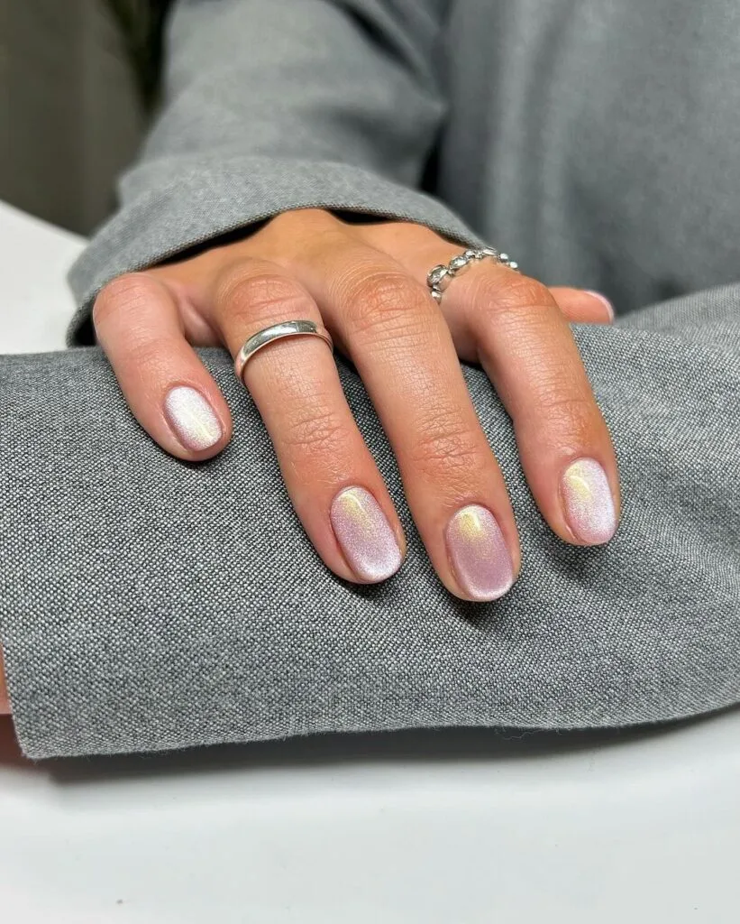 spring nail trends 2026, lavender pink cat eye short round nails with iridescent sheen