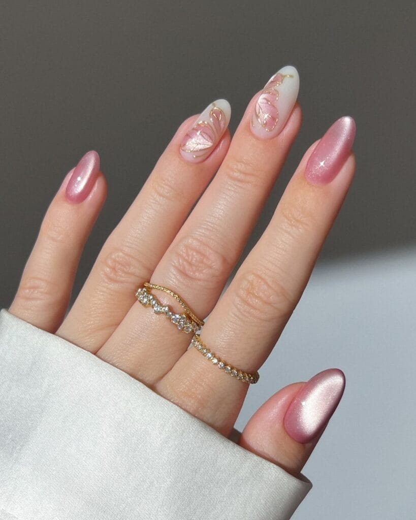 classy spring nails, almond pink chrome shimmer nails with gold butterfly art on white ombre accents