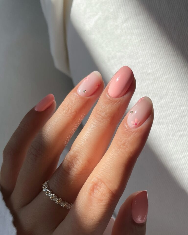 simple spring nails, almond soft pink nails with tiny hand-painted flower and micro rhinestone accents