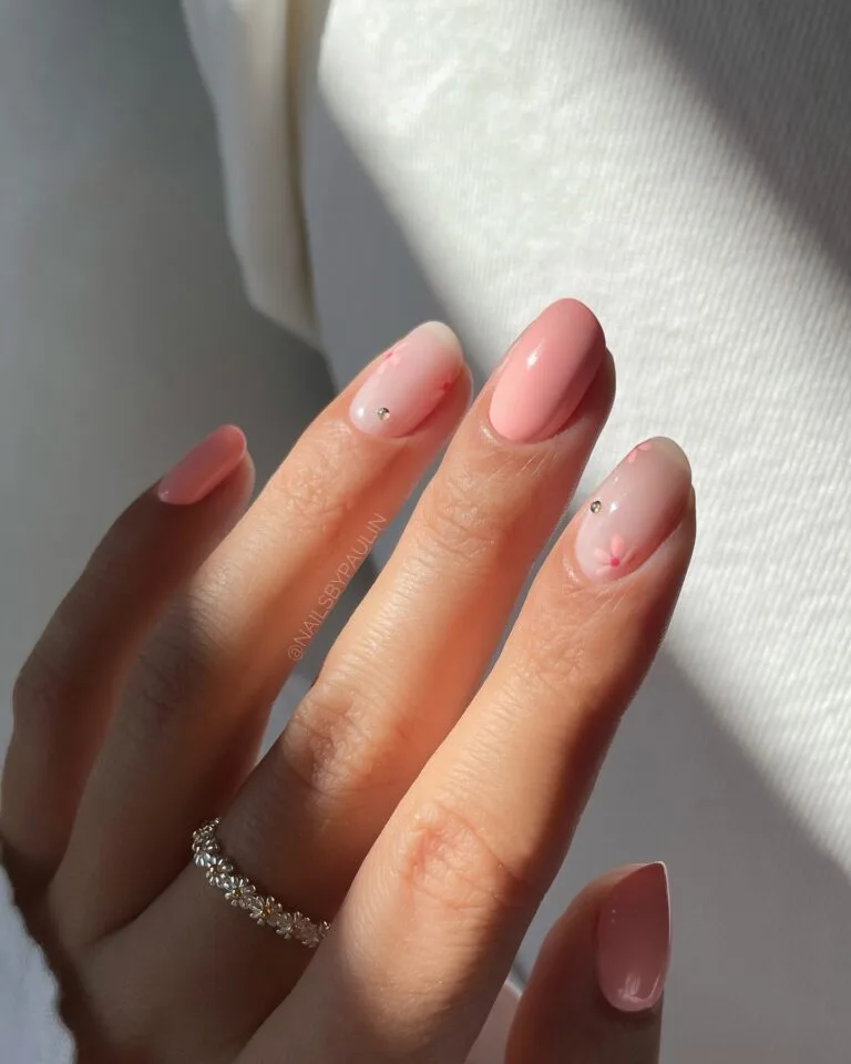 simple spring nails, almond soft pink nails with tiny hand-painted flower and micro rhinestone accents