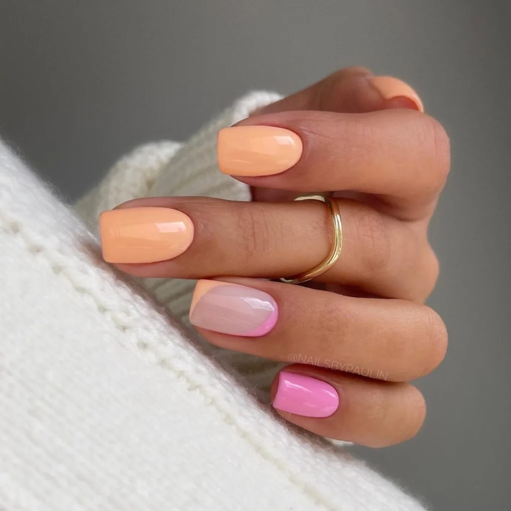 simple spring nails, short square peach and pink solid nails with milky accent nail and color outline details
