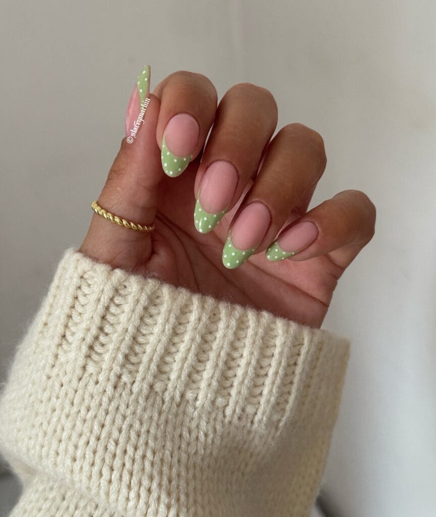 simple spring nails, almond pink nails with sage green French tips and white polka dots