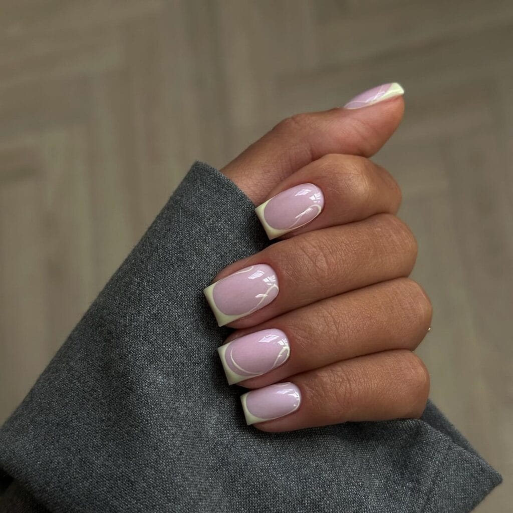 simple spring nails, short square lavender pink nails with yellow French tips and white tulip line art