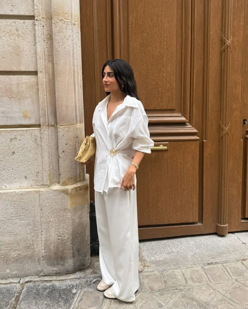 spring fashion trends 2026, all-white outfit with satin wide-leg trousers and cotton button-down