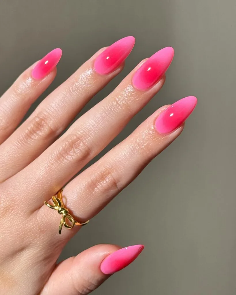 simple spring nails, almond hot pink aura nails with gradient blush center and sheer edges
