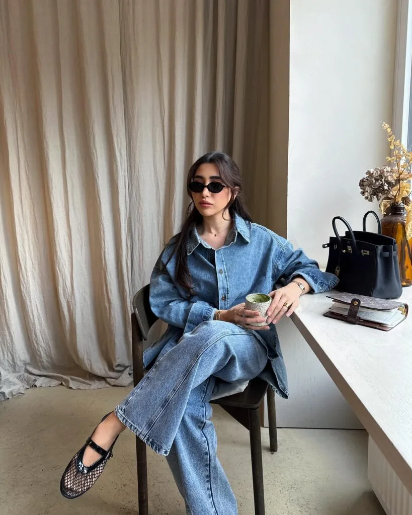spring fashion trends 2026, black woven mesh ballet flats with denim shirt and wide-leg jeans