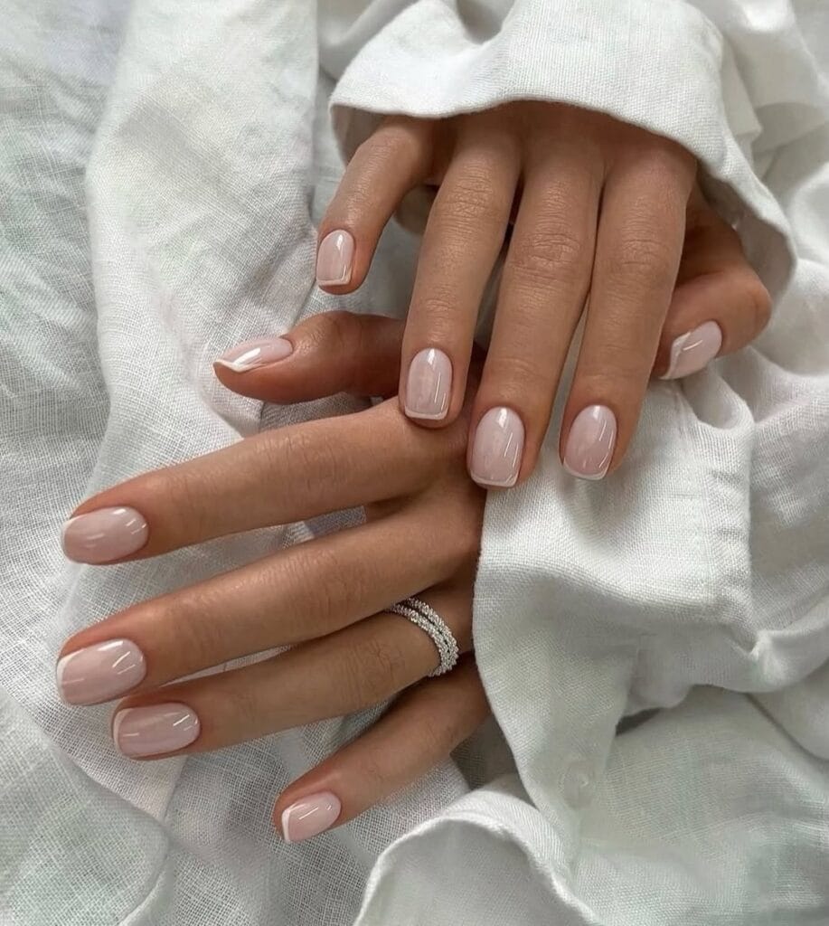 simple spring nails, short square milky sheer nails with subtle nude French tips