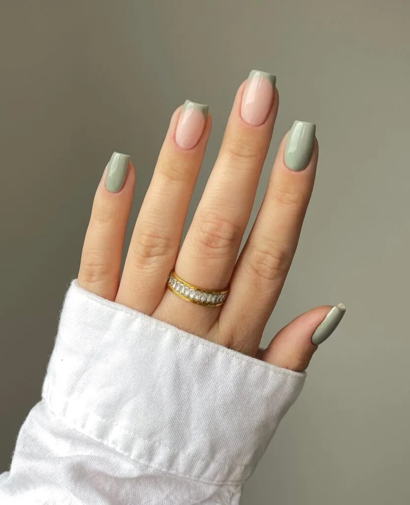 Image 3: may nail colors, muted sage green nails with nude French tip accent