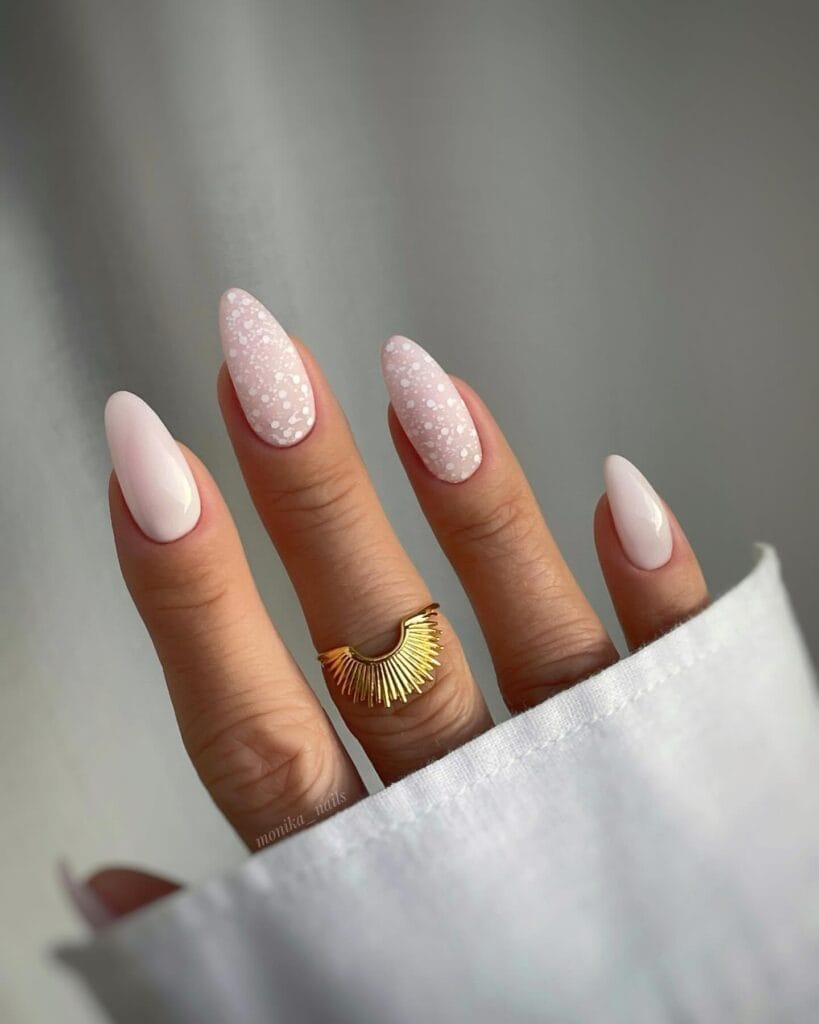 neutral summer nails, almond pale pink nails with white speckled terrazzo accent nails