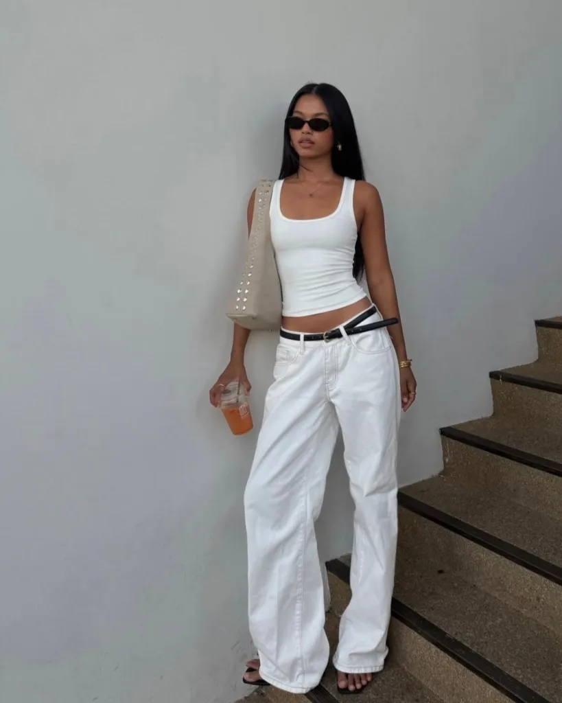 summer fashion trends 2026, white tank top and white wide-leg jeans with black belt and beige tote