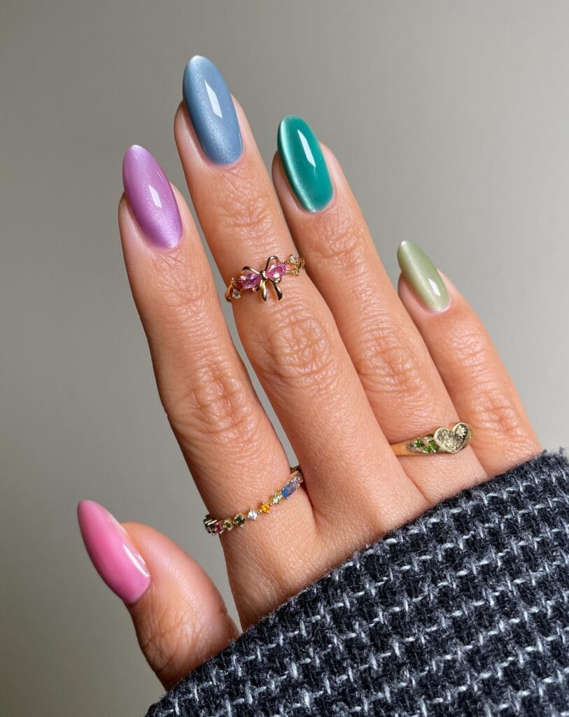 June nail ideas, multicolor cat eye chrome almond nails in pink lavender blue teal and sage
