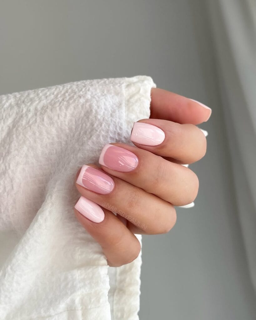 neutral summer nails, short square soft pink nails with subtle French tip accent nails and glossy finish