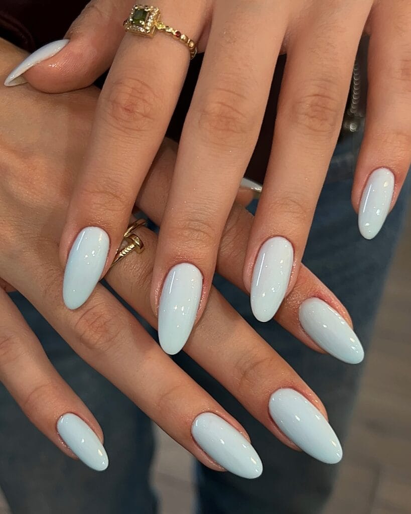 summer nail colors, baby blue glossy almond nails with gold rings
