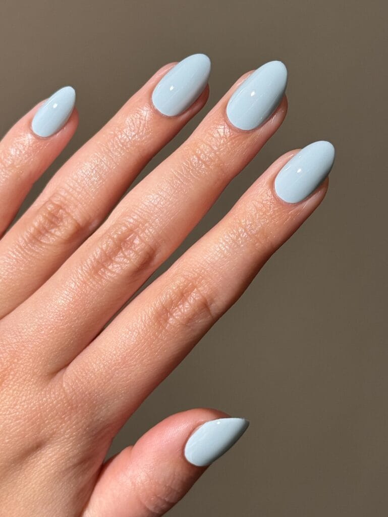 summer nail colors, baby blue glossy almond nails with clean finish