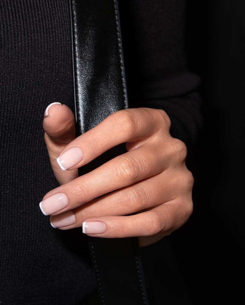 neutral summer nails, short square classic French manicure with nude base and white tips
