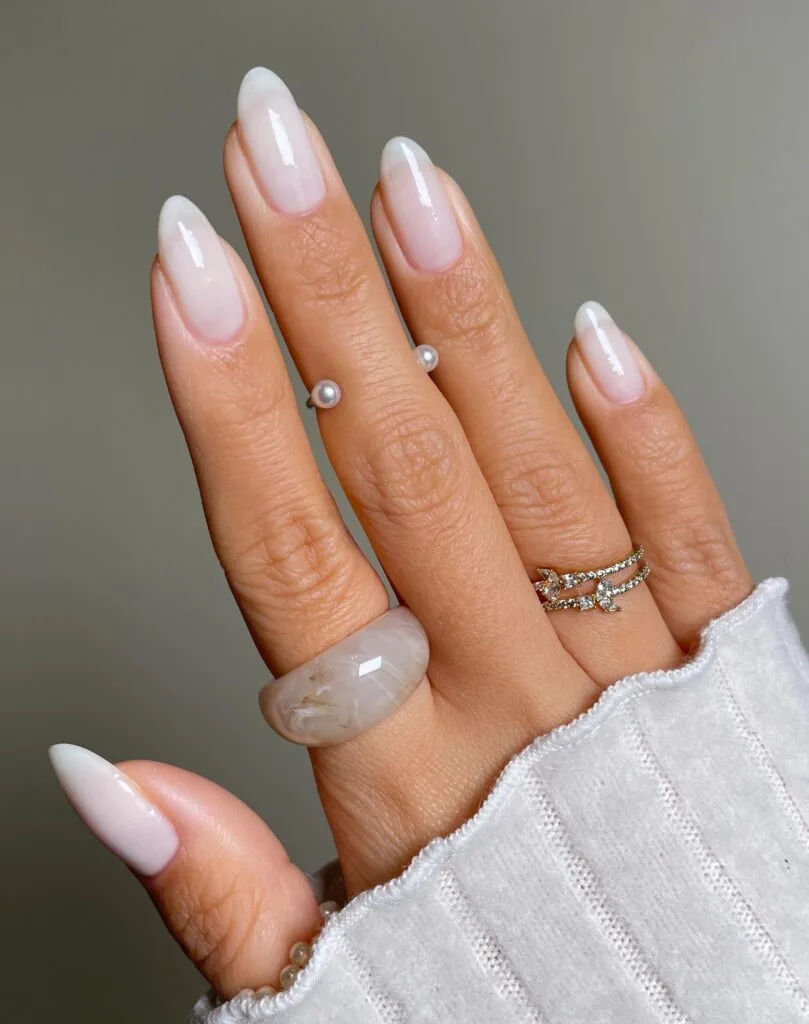 june nail color trends, cloud white glossy almond nails with translucent milky finish