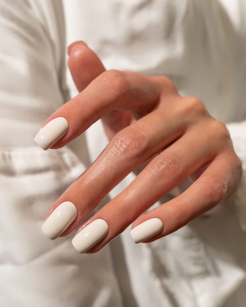 neutral summer nails, short square creamy ivory solid color nails with glossy finish
