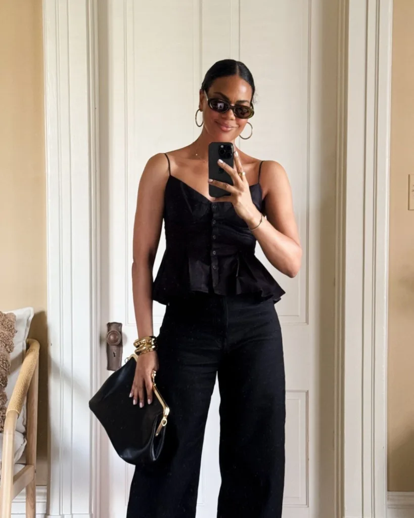 summer fashion trends 2026, black peplum button-front cami with black wide-leg pants and gold bracelets