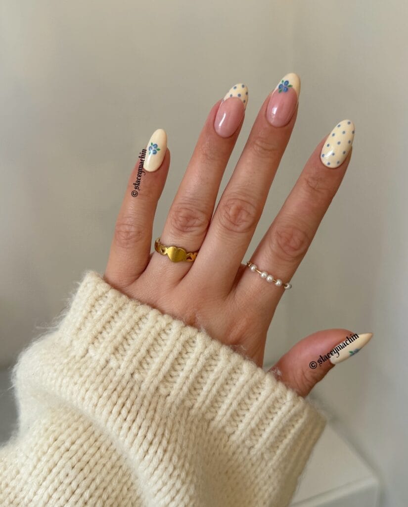 june nail color trends, butter yellow almond nails with blue polka dots and blueberry art