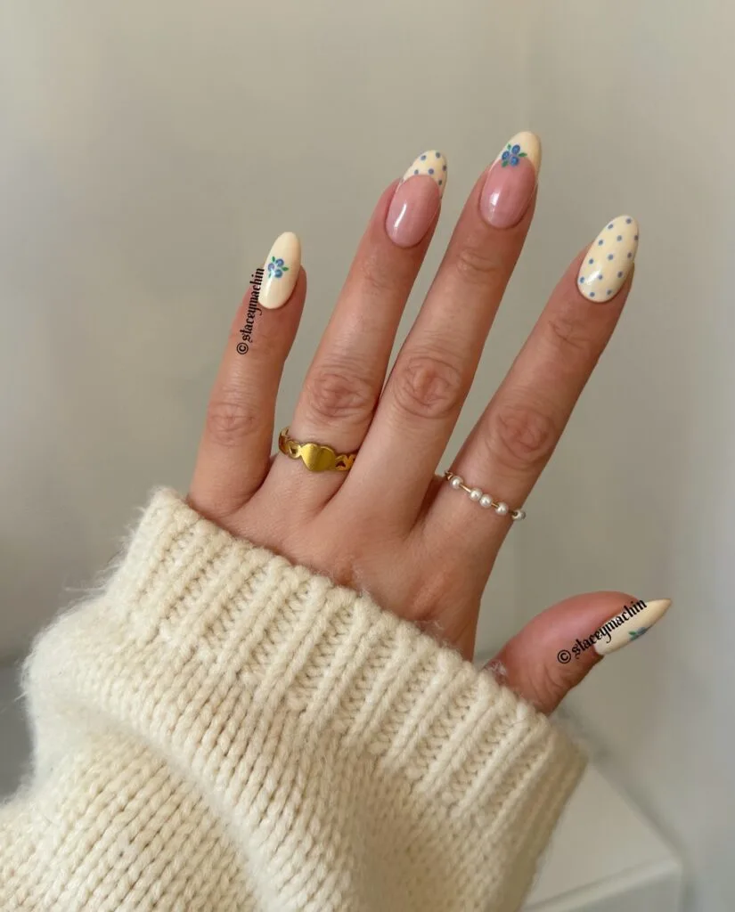 june nail color trends, butter yellow almond nails with blue polka dots and blueberry art