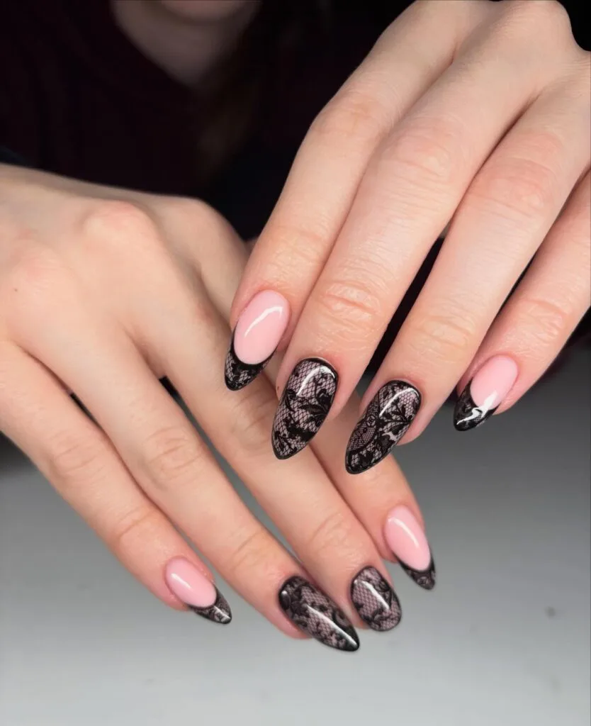 summer nail trends 2026, black lace floral nail art on nude pink almond nails