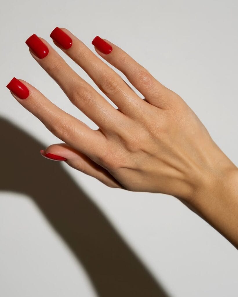 summer nail colors, tomato red glossy short square nails with shadow detail