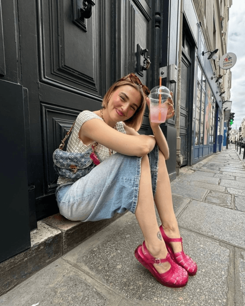 summer fashion trends 2026, hot pink jelly fisherman sandals with denim skirt and tweed top