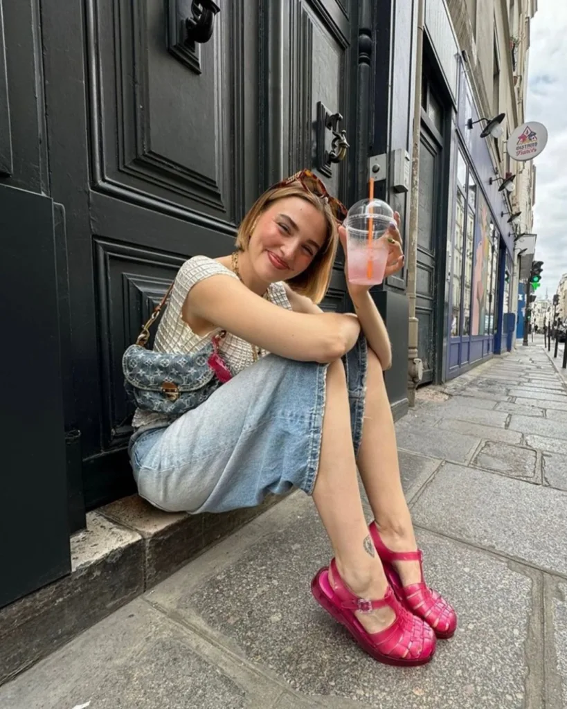 summer fashion trends 2026, hot pink jelly fisherman sandals with denim skirt and tweed top