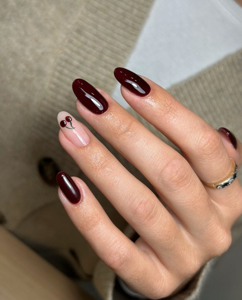 summer nail colors, deep cherry glossy almond nails with sheer nude cherry accent nail