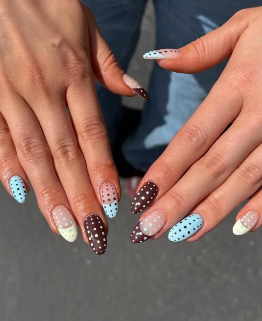 summer nail trends 2026, baby blue and chocolate brown polka dot almond nails with cream accents