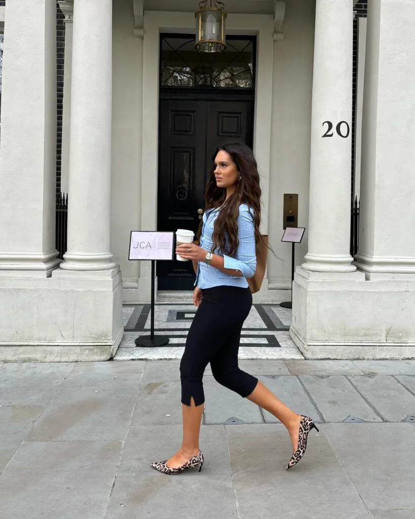 summer fashion trends 2026, black split-hem capri pants with blue button-down and leopard kitten heels