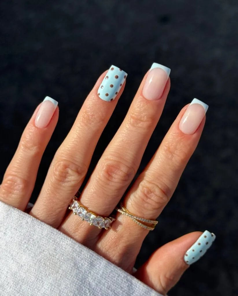 summer nail trends 2026, square nails with baby blue French tips and brown polka dot accent nail