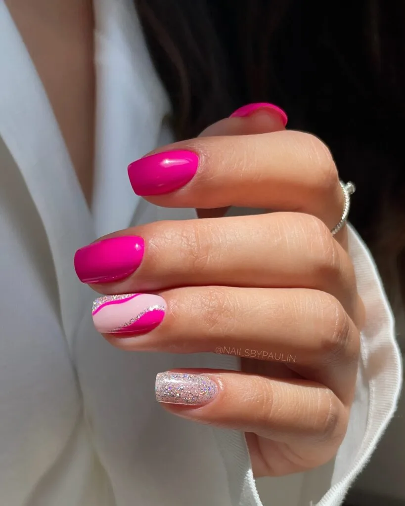 july nail colors, hot magenta square nails with pink swirl and silver glitter accent nails