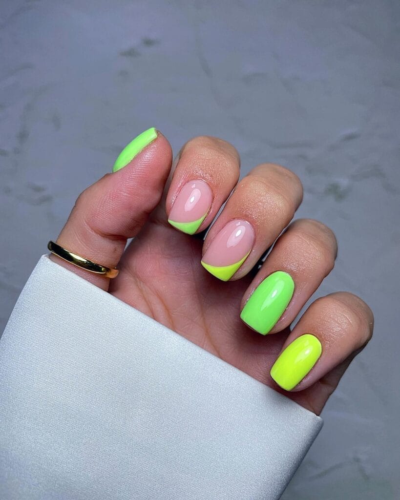 july nail colors, neon lime and green square nails with green French tip accents on nude base