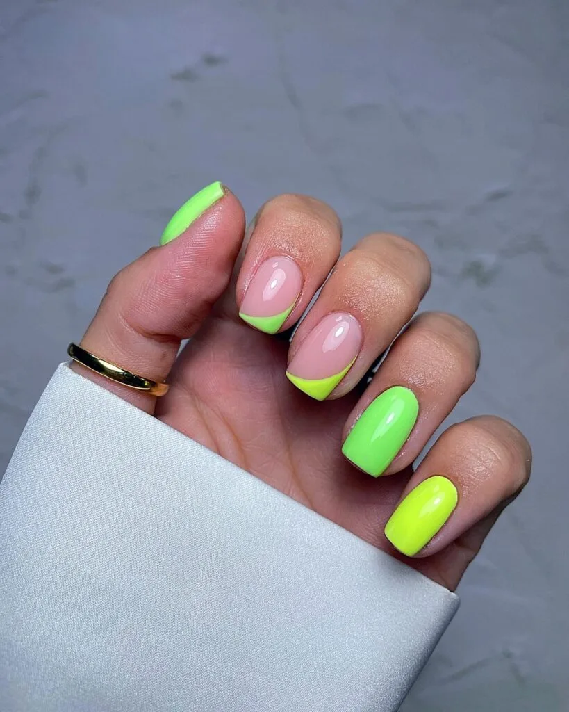 july nail colors, neon lime and green square nails with green French tip accents on nude base
