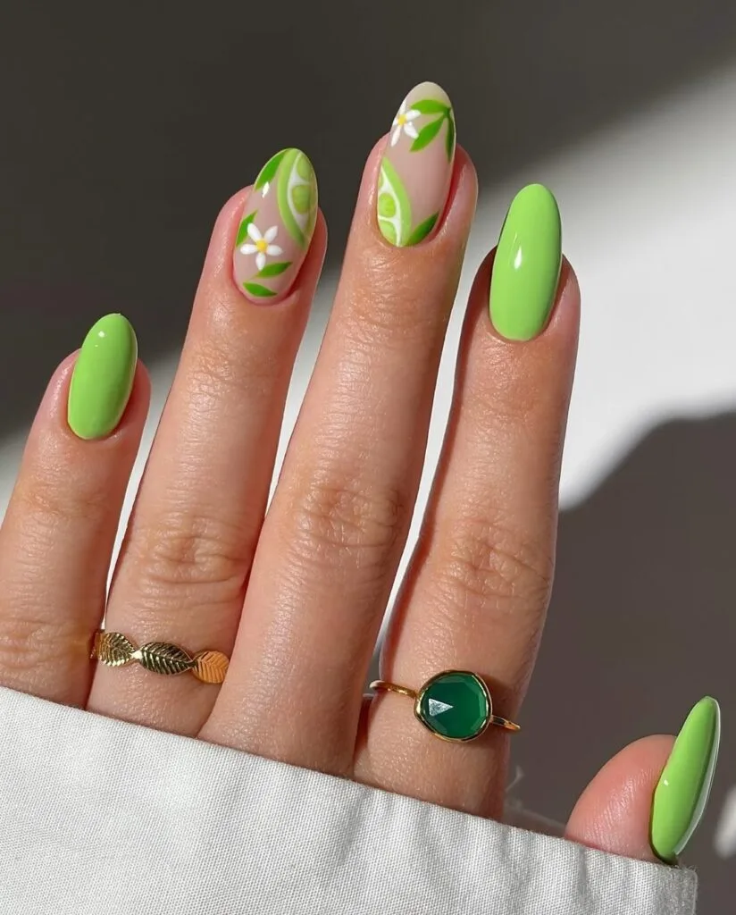july nail colors, bright lime green almond nails with lime slice and daisy art accent nails